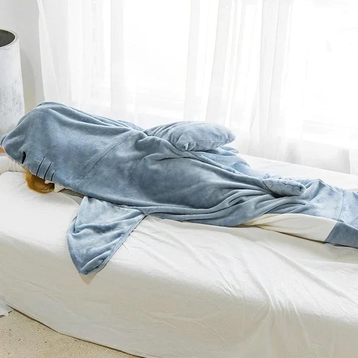 Shark Snuggly onesie lounging