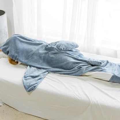 Shark Snuggly onesie lounging