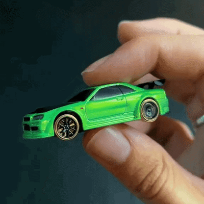 Mini RC drift car driving on a smooth indoor surface