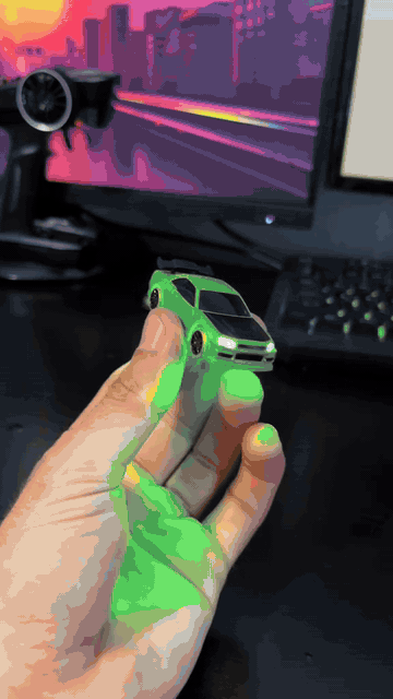 Mini RC drift car demonstrating its lights, controller and drifting