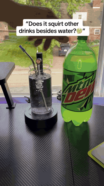 Rechargeable desktop water dispenser in use